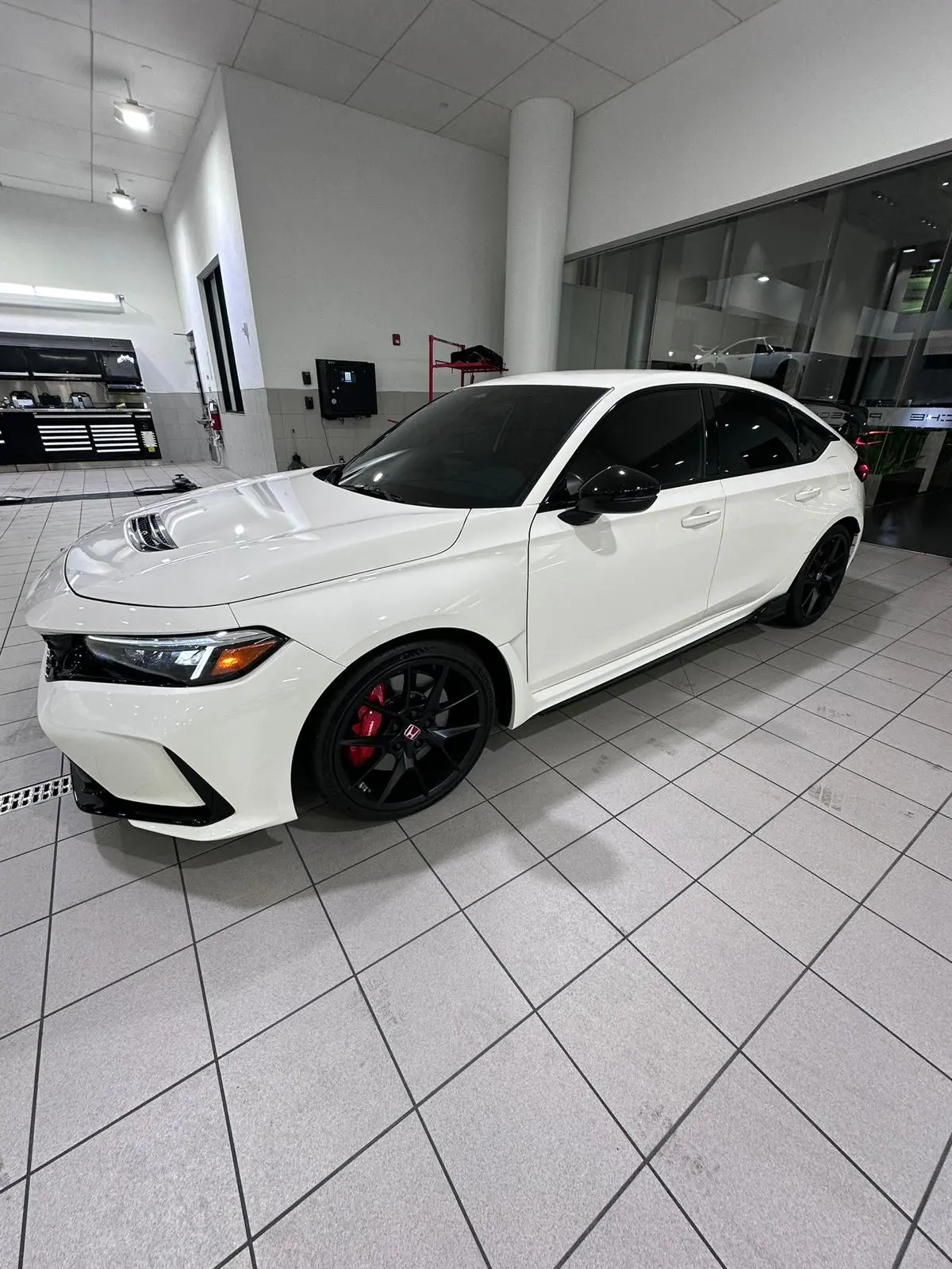 White Honda Civic Type R with dark tinting