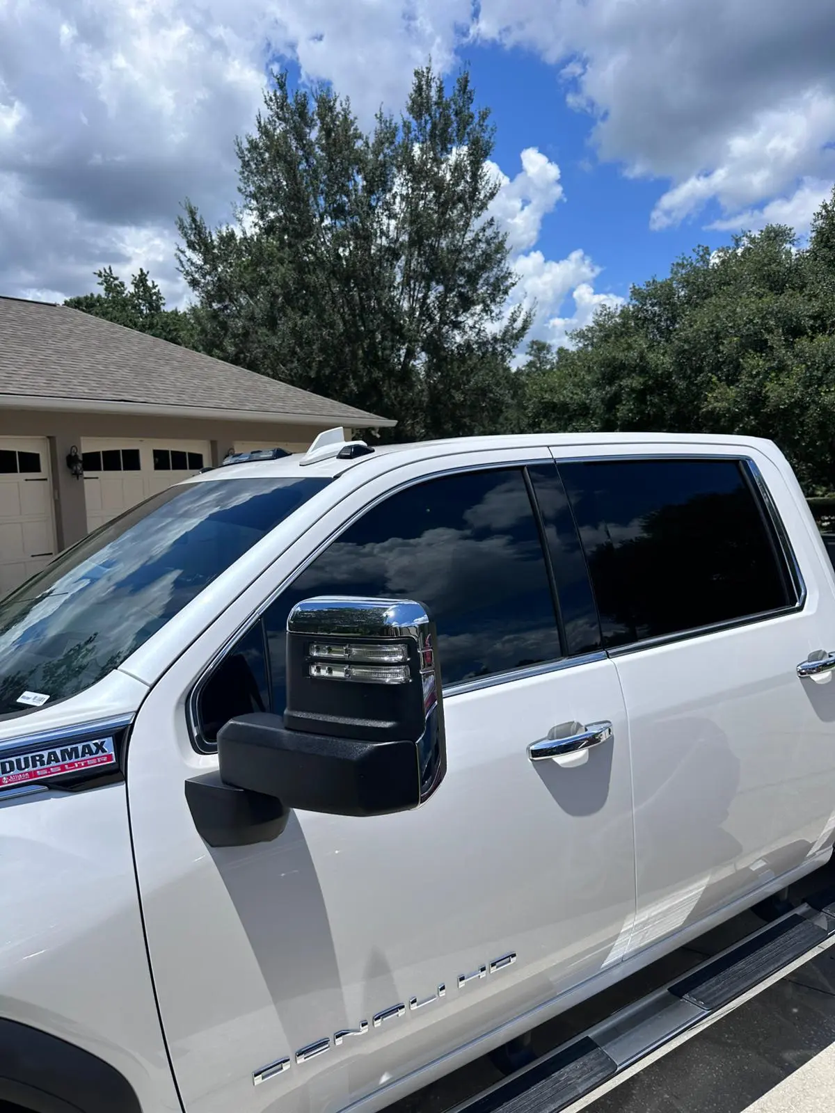White Chevrolet Silverado with professional tinting