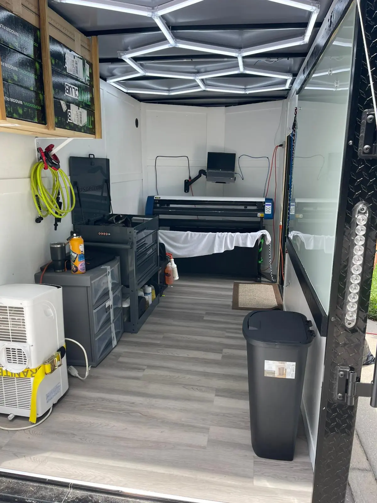 Professional mobile tinting workstation with LED lighting and organized equipment